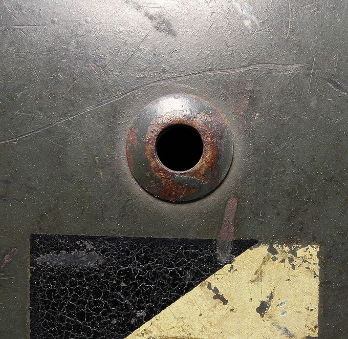 M35 NS air-vent bushing right side (the same helmet as the picture above). Note the smaller vent hole compare to the left side vent hole in the picture above.