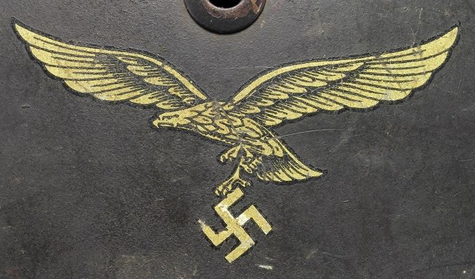 Luftwaffe decal on an M35 NS. The same type of decal as pictured above. Notice the golden color resulting from the lacquer on the decal yellowing over time