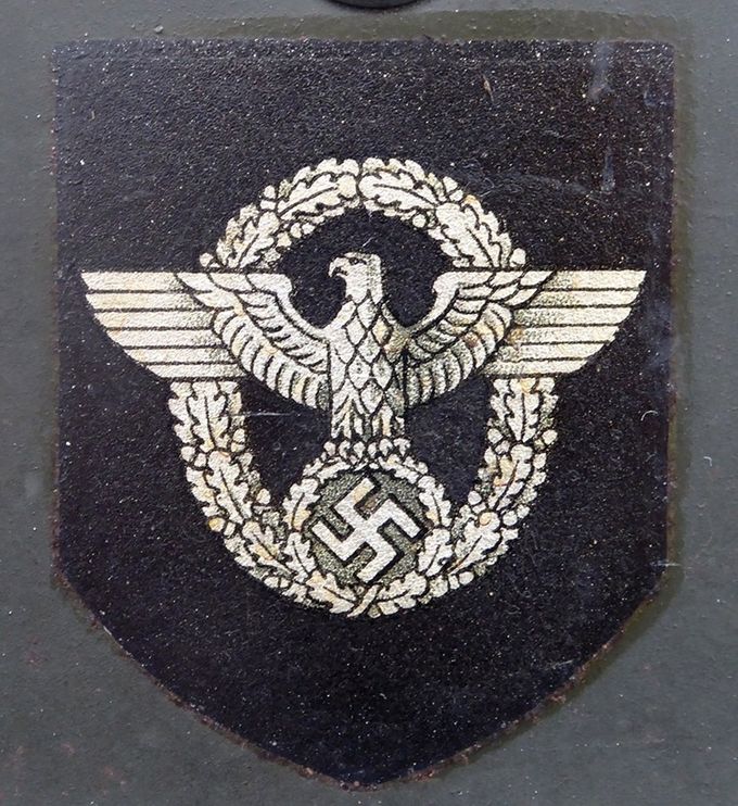 Polizei decal on an M35 NS. Note the fine details and the row of talons clutching the oakleaves.