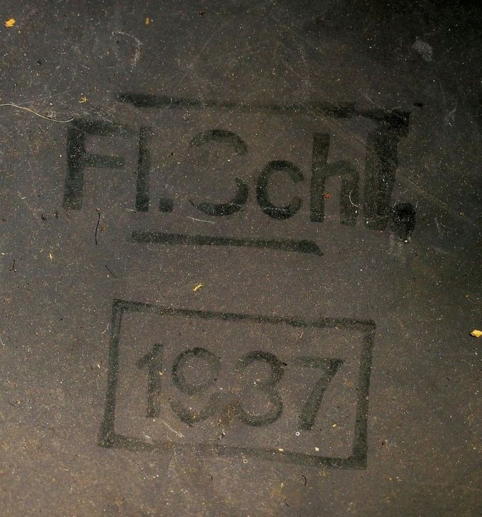 Unit stamp and date inside the dome of a Luftwaffe helmet. Fl. Schl. (Flieger Schule) means Pilot School.