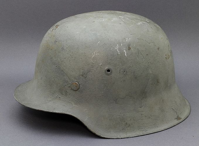 M42 ET66 with shipboard gray paint. This helmet was found near a former Kriegsmarine base in Norway.