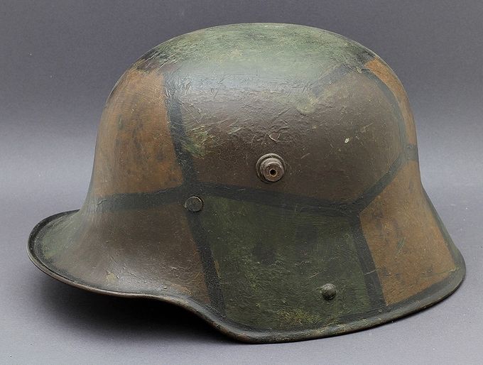 M17 ET64 painted in the classic 1918 camouflage scheme of brown, ochre (yellow-tan) and green with black dividing lines. Notice also the black line which follows the edge of the rim. Purchased in the USA from Paul Dorow.