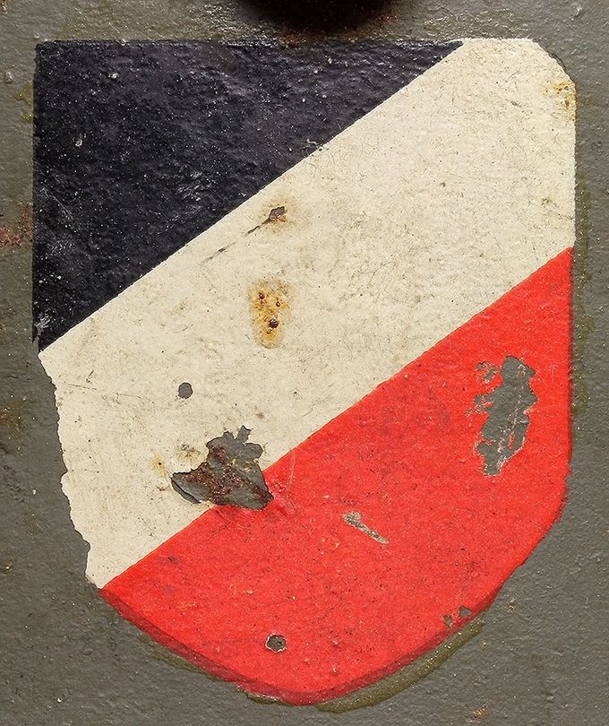 The national shield on the same M16/M17 Austrian helmet.