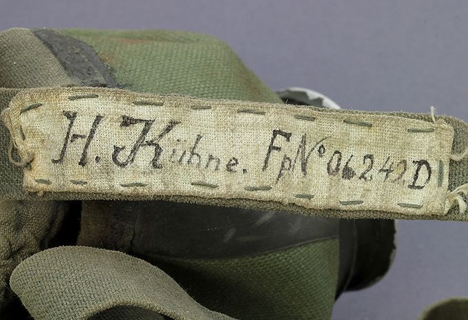 Naming on cloth line on a gas mask used by a German navy soldier. 