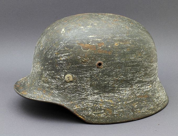 M35 ET64 with dark gray paint. The helmet has been covered with a layer of whitewash, but most of it has been removed or worn off. Notice the 