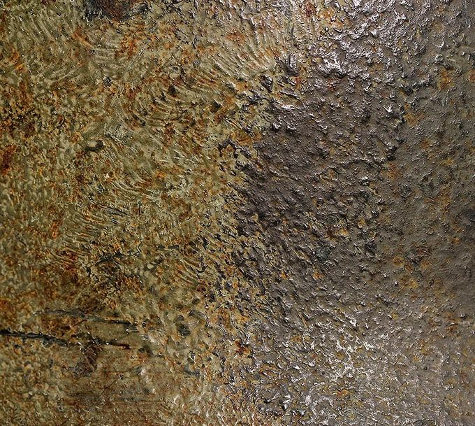 The paint structure of the M42 helmet above. Notice the texture that indicates the paint has been applied with a thick brush or cloth.