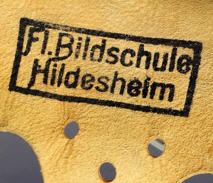 Ink stamp on the inside of a liner. Fl. Bildschule, Hildesheim means Pilot Education School in Hildesheim.