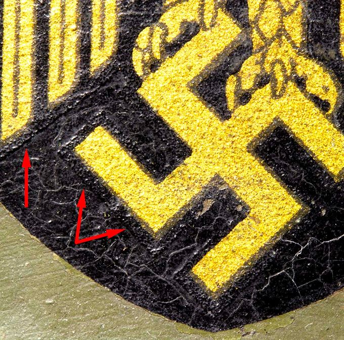 Detail of the black border around the swastika and lower part of wing head. The picture is made more bright to show the border line better.