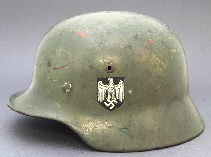 M35 SE Heer helmet with smooth matte paint. Referred to pea green factory paint.