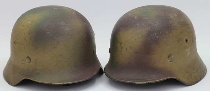 The helmet described above together with an another M35 ET64 camo found in the same county/district in Norway. Same kind of paint pattern, probably from the same German unit.